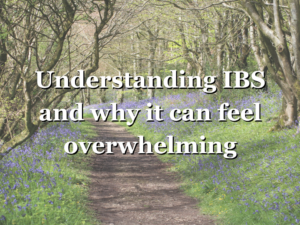 Woodland path lined with bluebells, used as a featured image for an article about understanding IBS.